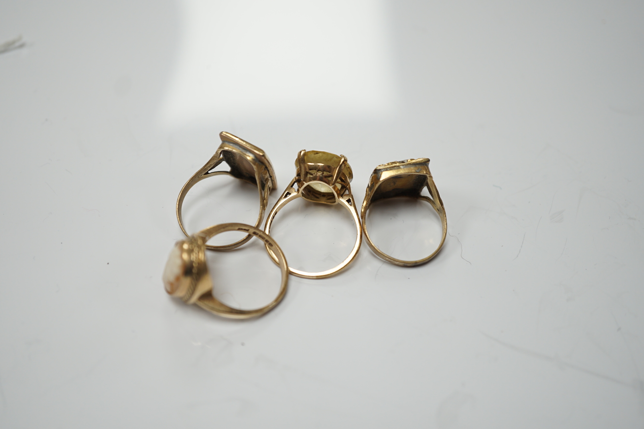 Two 19th century yellow metal mourning brooches, now with shanks converted to dress rings and two other 9ct rings.